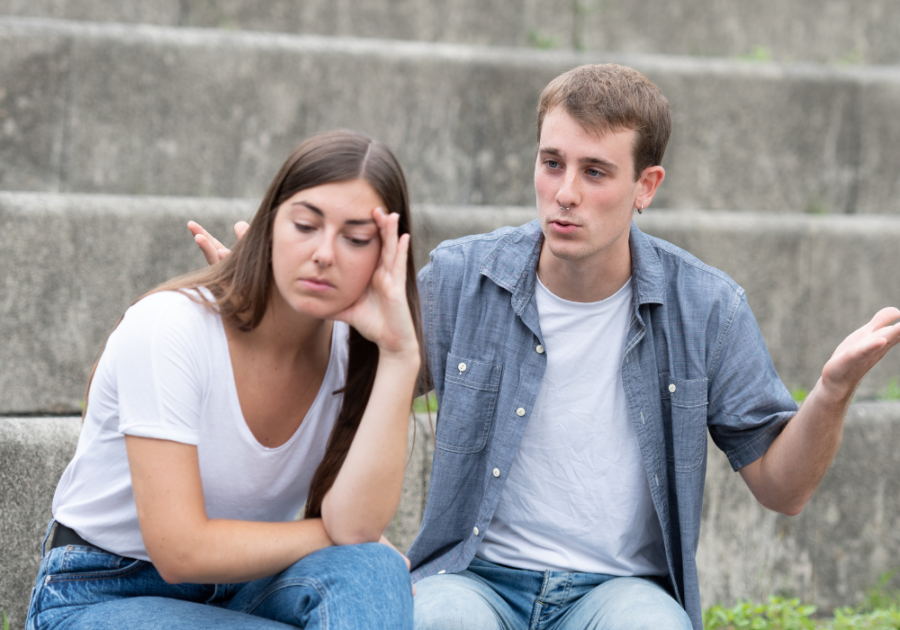 couple sitting on bench upset with each other Signs of a Tumultuous Relationship