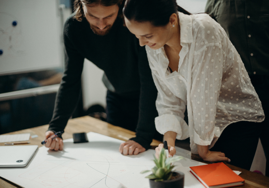 couple working together in office Aesthetic Attraction