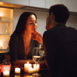 couple having romantic candlelight dinner Dating Exclusively