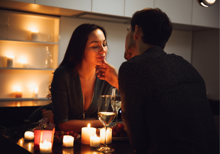 couple having romantic candlelight dinner Dating Exclusively
