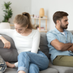 couple sitting on sofa angry not talking what lack of intimacy does to a woman