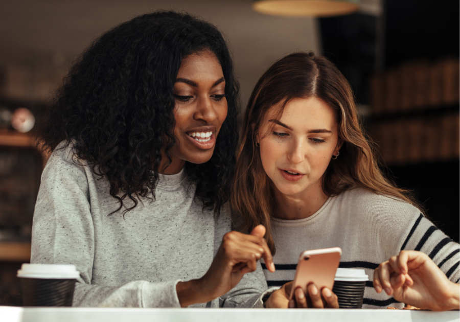 woman standing close looking at phone in Love with My Best Friend Quiz