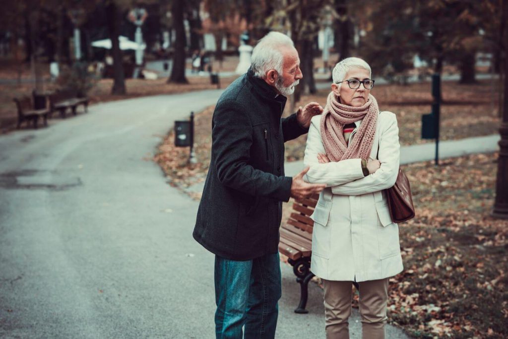 older couple outside sad Signs You Have a Bad Attitude 