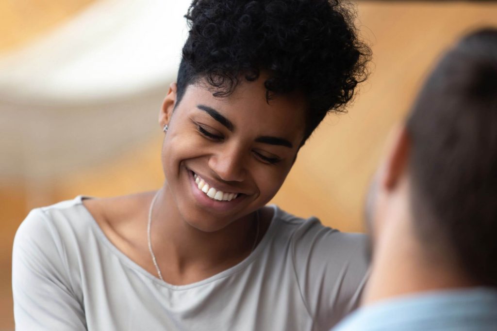 woman smiling at man Stop Loving a Married Woman