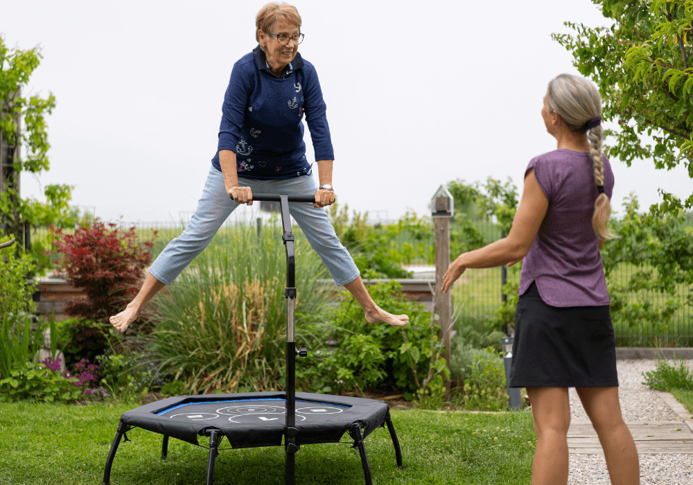 senior woman jumping in trampoline best rebounder for seniors