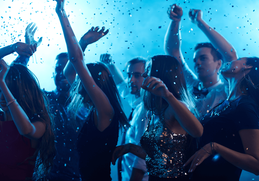 group of people in a late night party best songs for retirement