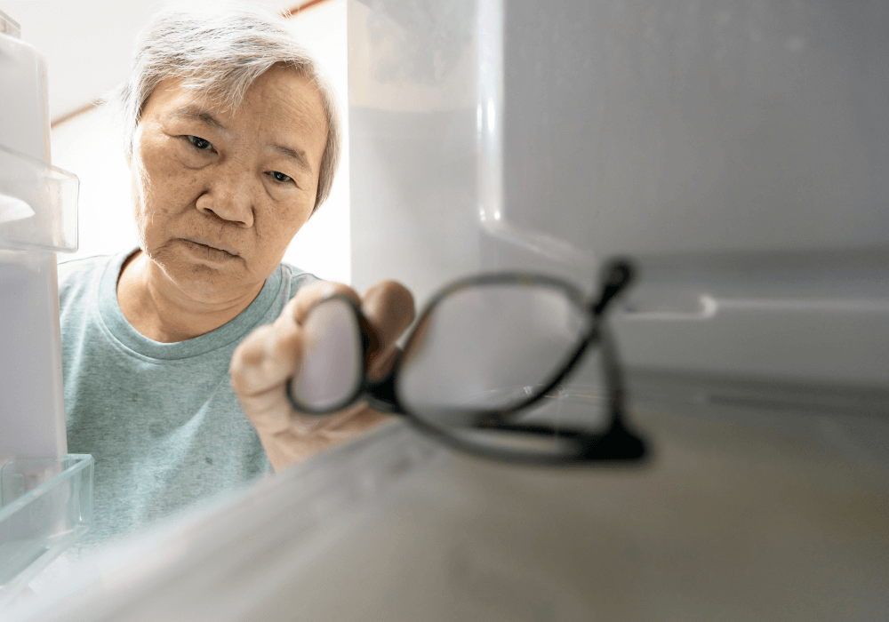 senior woman looking at glasses in cabinet How to Find Things You Lost At Home